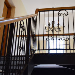 The high ceilings and grand staircase to Benoch Luxury Castle Apartment, Loch Lomond